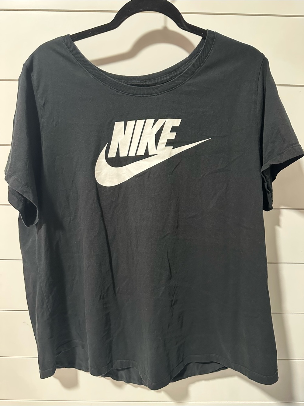 Nike Black Tee with White Logo and Pink Accent Nails Visible